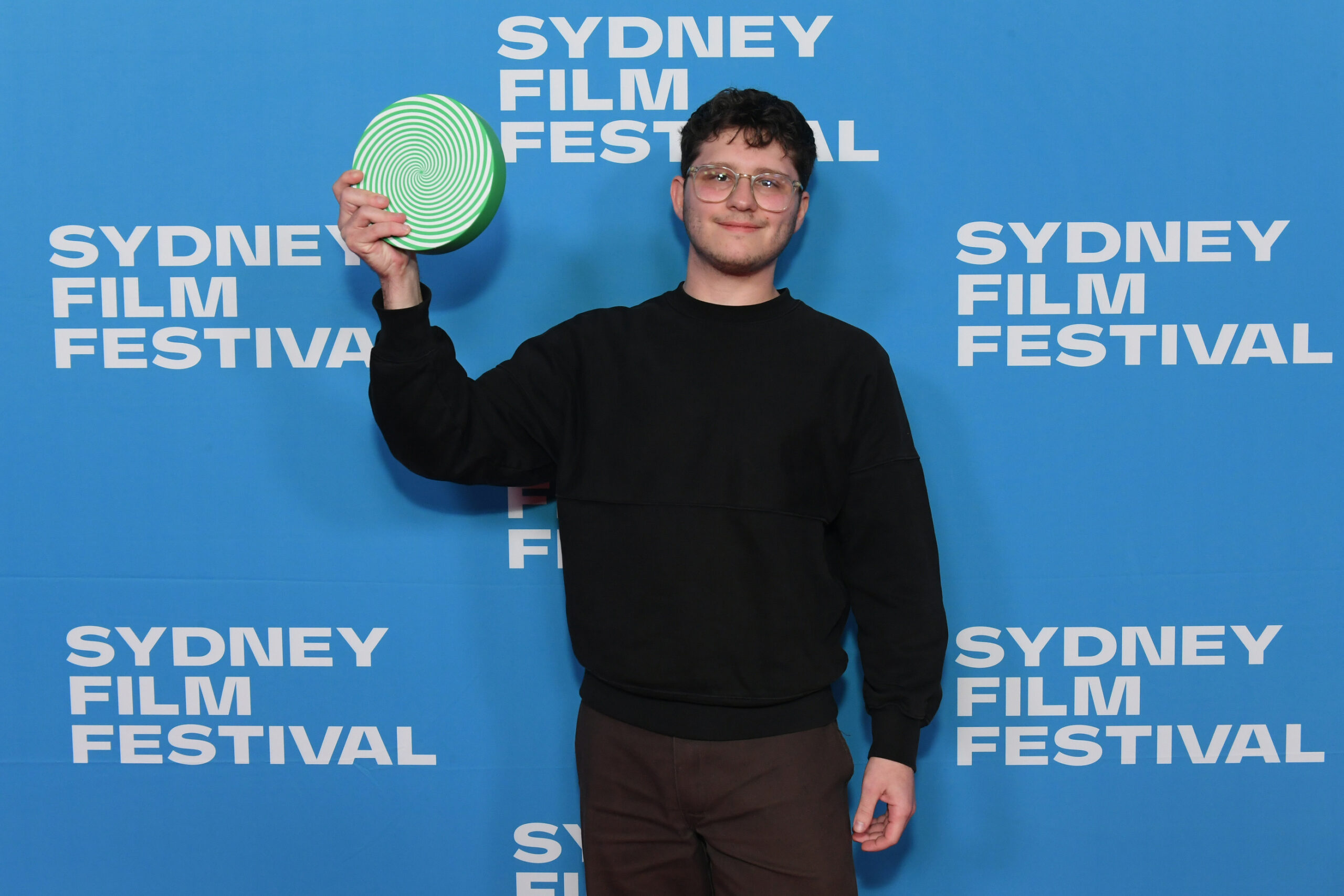 <p>Sustainable Future Award – FLOODLAND – Jordan Giusti<br />
Sydney Film Festival 2025 – Closing Night – Award Winners 2025 at State Theatre, Market St, Sydney – Sunday 15th June, 2025<br />
Photographer: Belinda Rolland © 2025</p>
